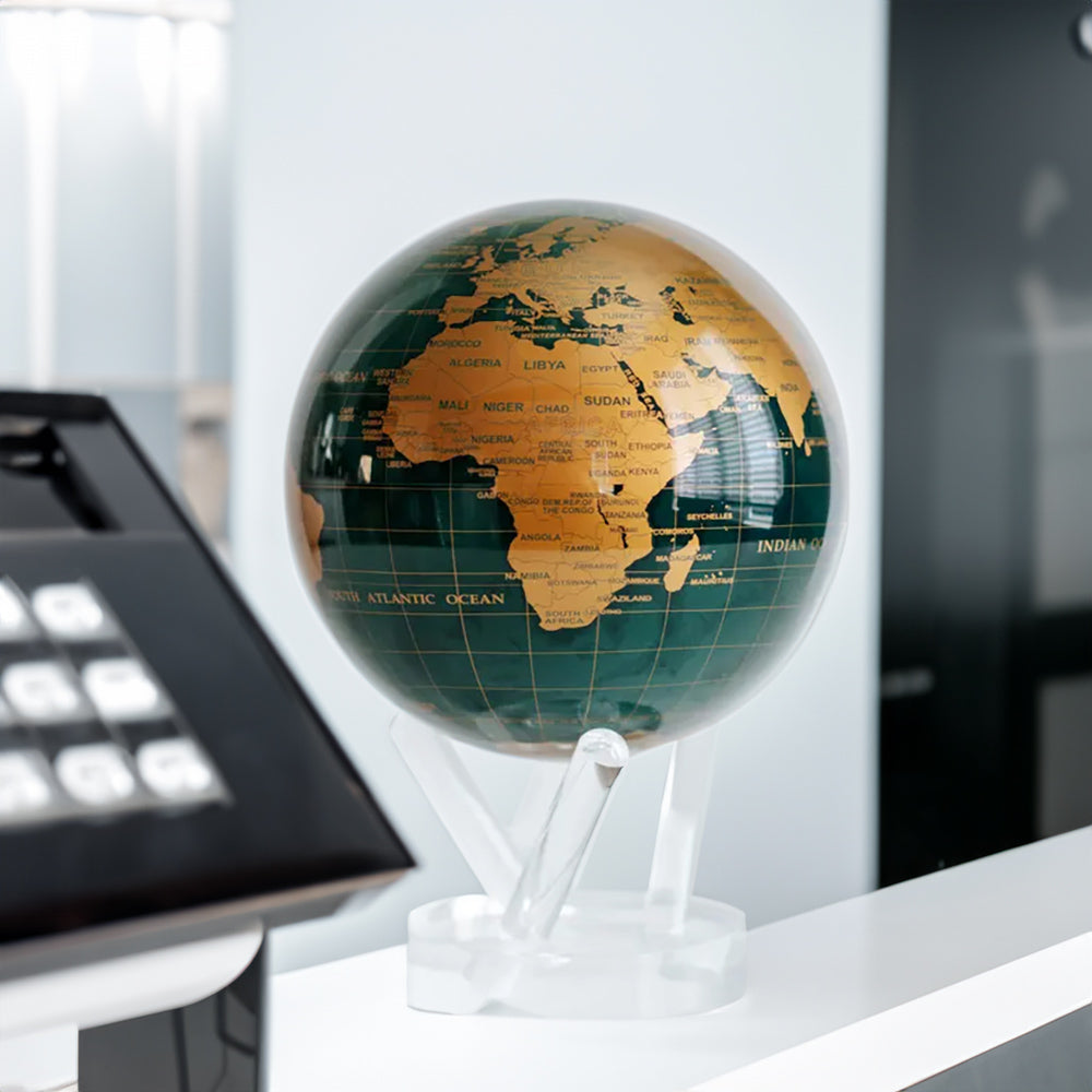 Emerald Green & Gold MOVA Globe on desk contemporary workspace accent