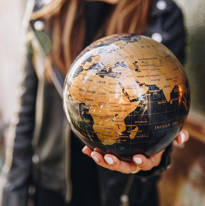 BLACK AND GOLD GLOBE | Turns using ambient light - MOVA UK