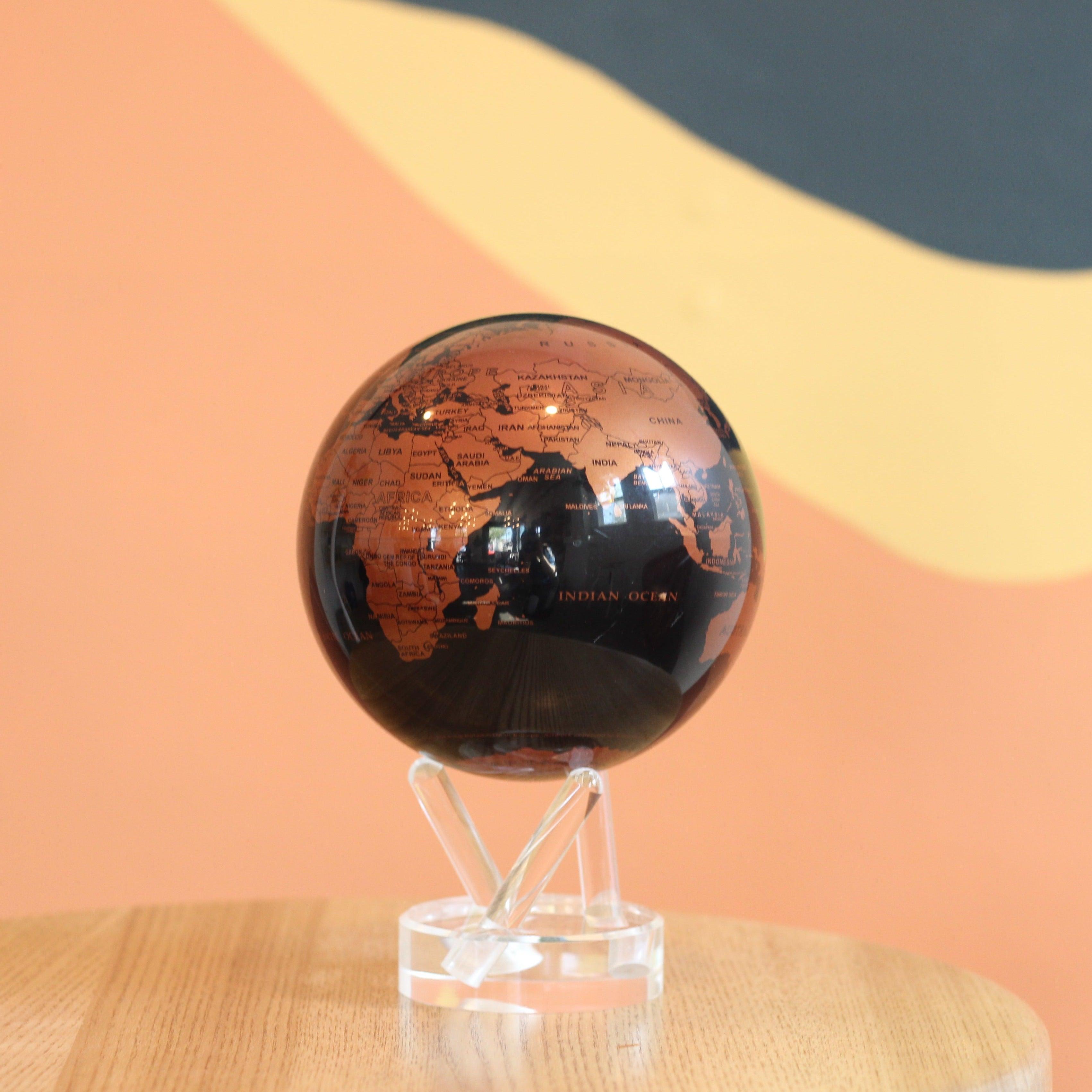BLACK AND COPPER GLOBE | Turns using ambient light - MOVA UK