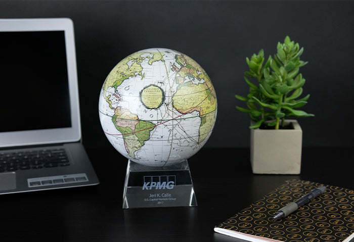 Personalized MOVA globe with engraved crystal base for corporate gifting