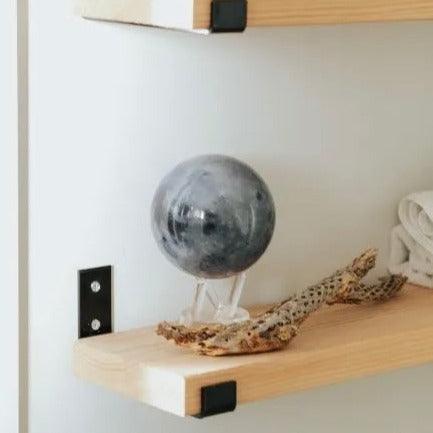 MOVA Moon globe on shelf, space-inspired home decor and thoughtful gift for astronomy enthusiasts