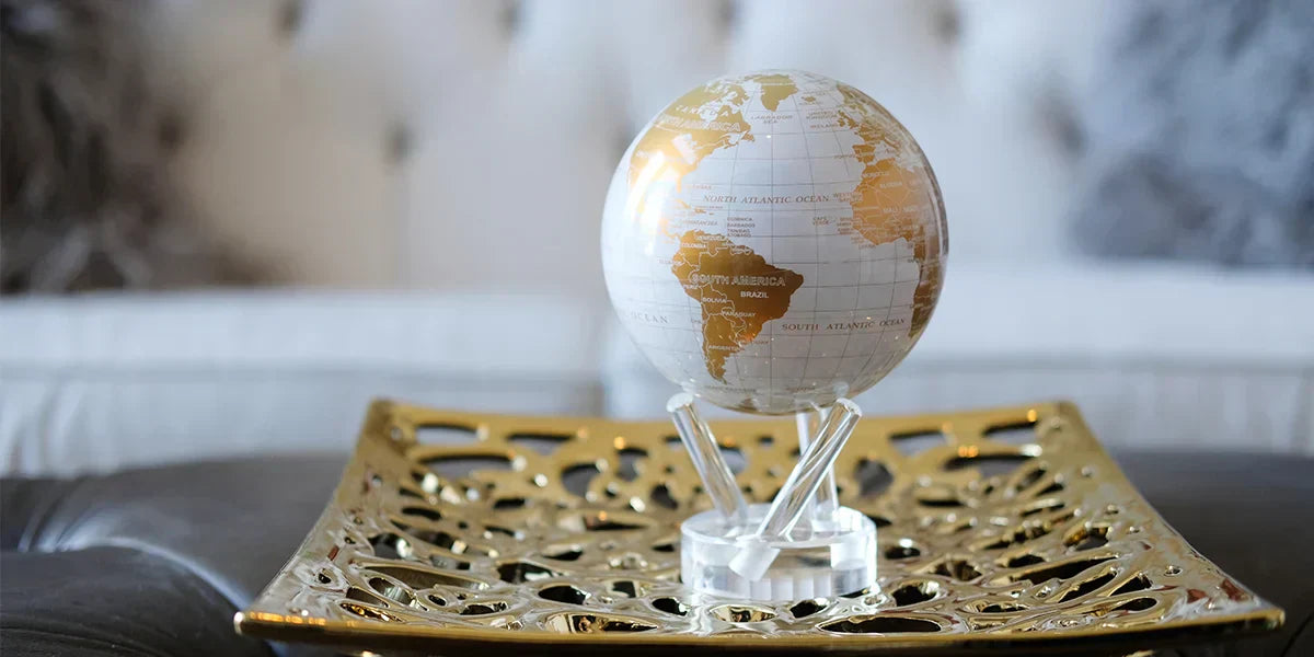 Introducing the White and Gold MOVA Globe: A Dazzling New Addition to Our Collection