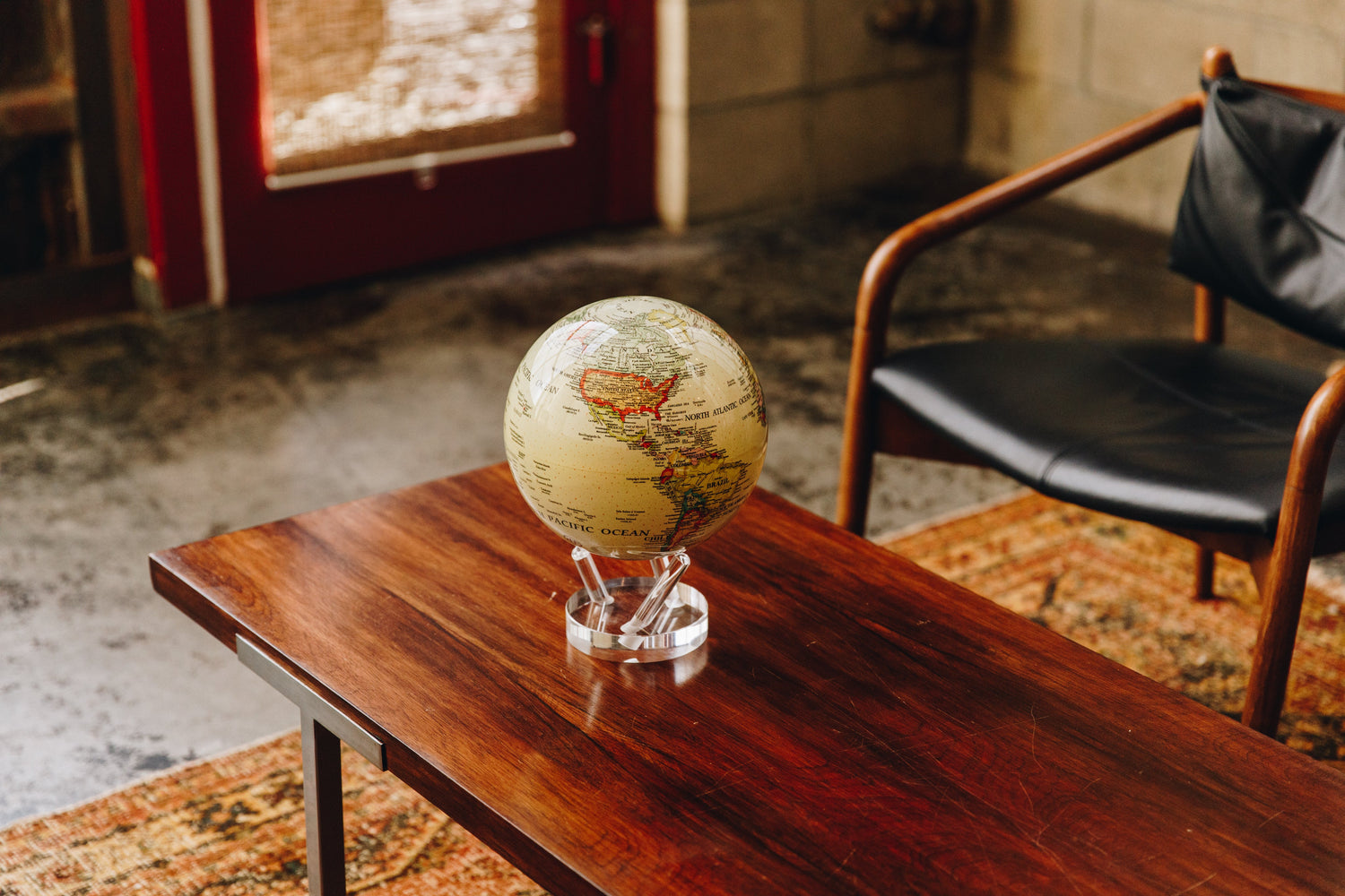 Vintage globe on table