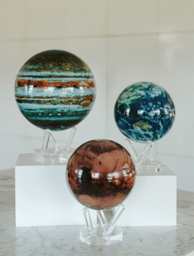 Outer space MOVA globe collection featuring Earth, Mars, and Jupiter designs