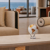 Pearl White & Gold globe in luxury interior