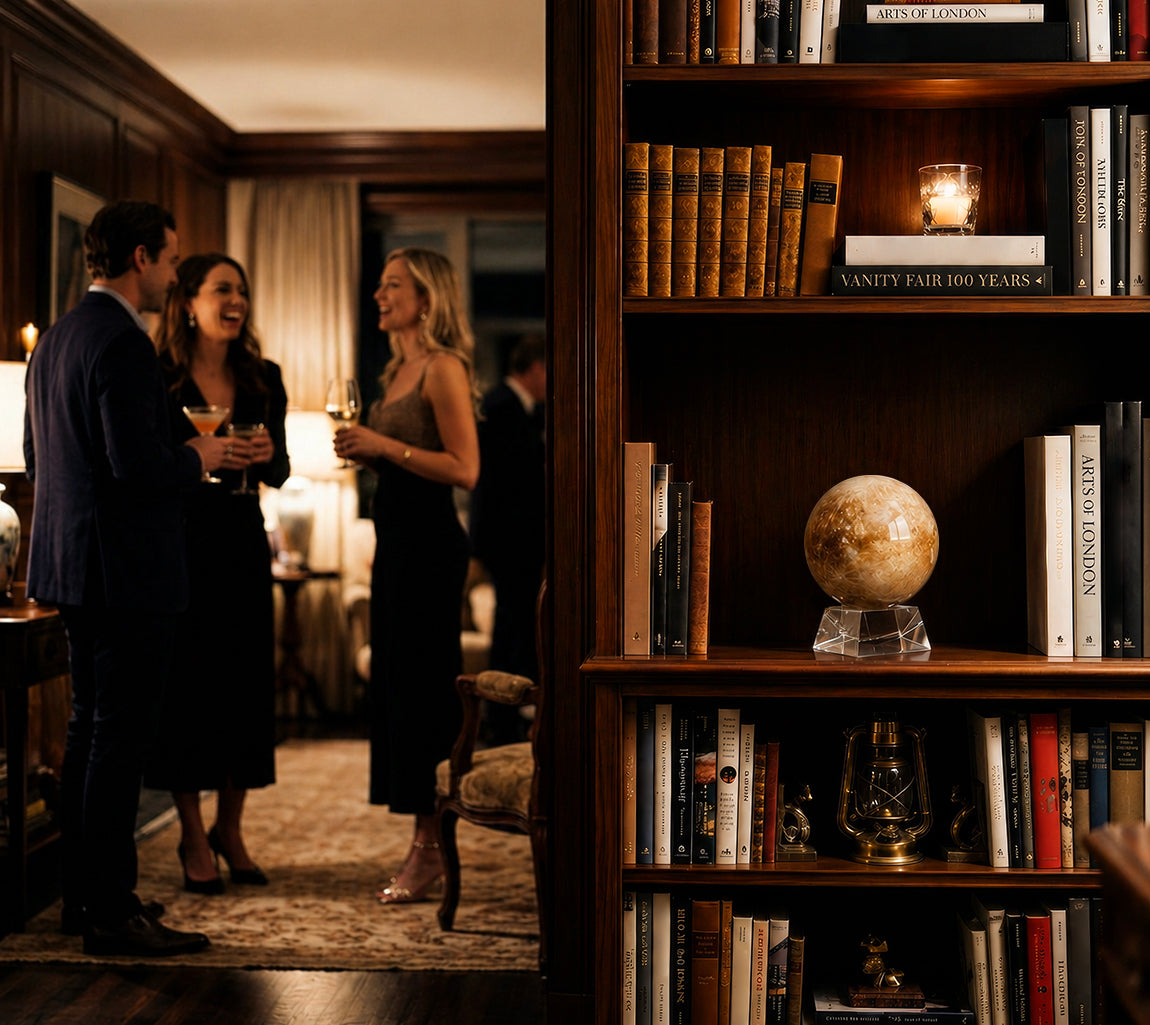 Decorative MOVA globe displayed as an elegant bookshelf centerpiece
