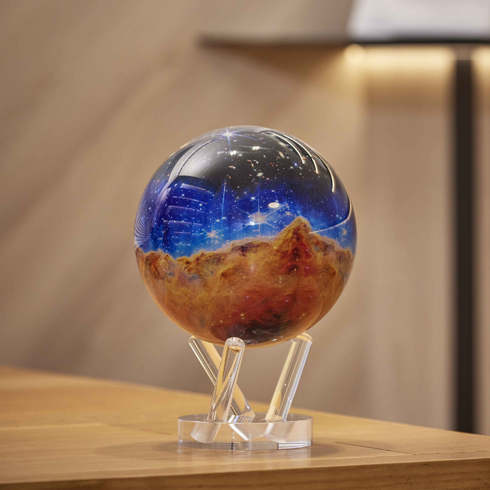 James Webb Carina Nebula MOVA Globe displayed on wooden desk space decor