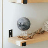 MOVA Moon globe on shelf, space-inspired home decor and thoughtful gift for astronomy enthusiasts