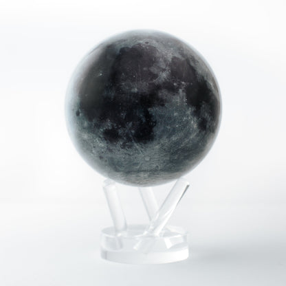 Close-up of MOVA Moon rotating globe on clear stand, detailed lunar landscape for astronomy decor and cosmic gift