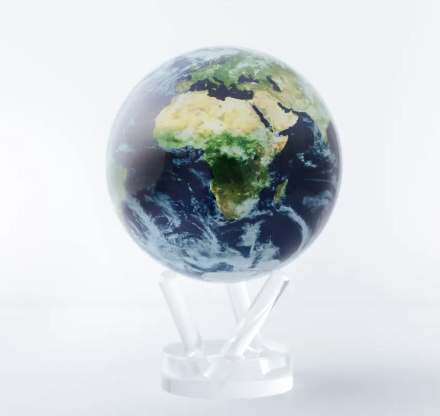 Rotating Earth with Clouds MOVA Globe on transparent stand, minimalist desk ornament and unique gift