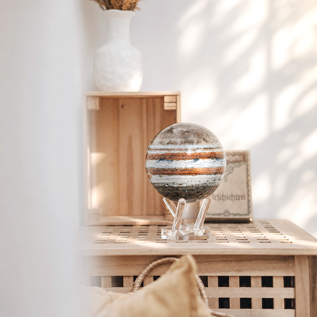 Jupiter MOVA globe with acrylic base styled in a bright Scandinavian inspired living space