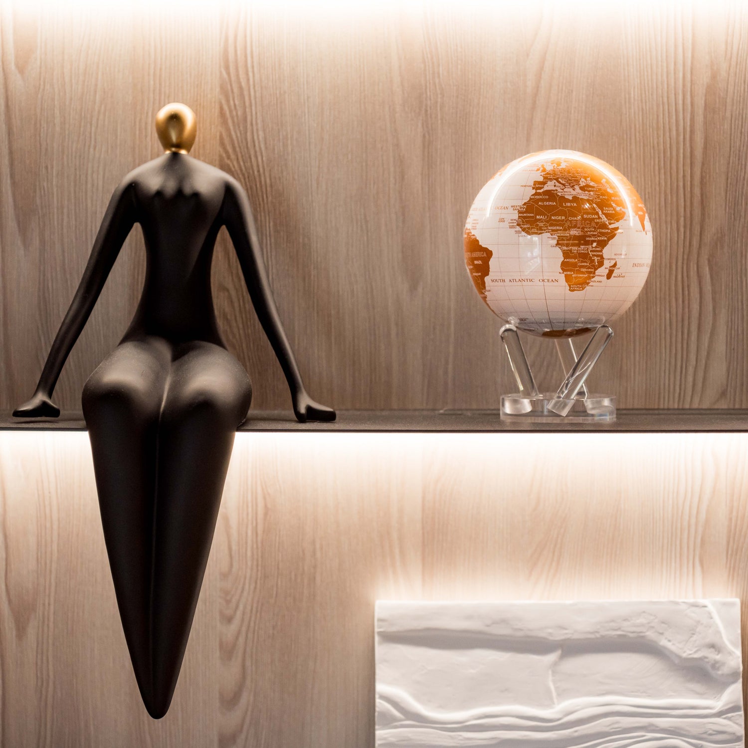 Pearl White &amp; Gold globe on display shelf