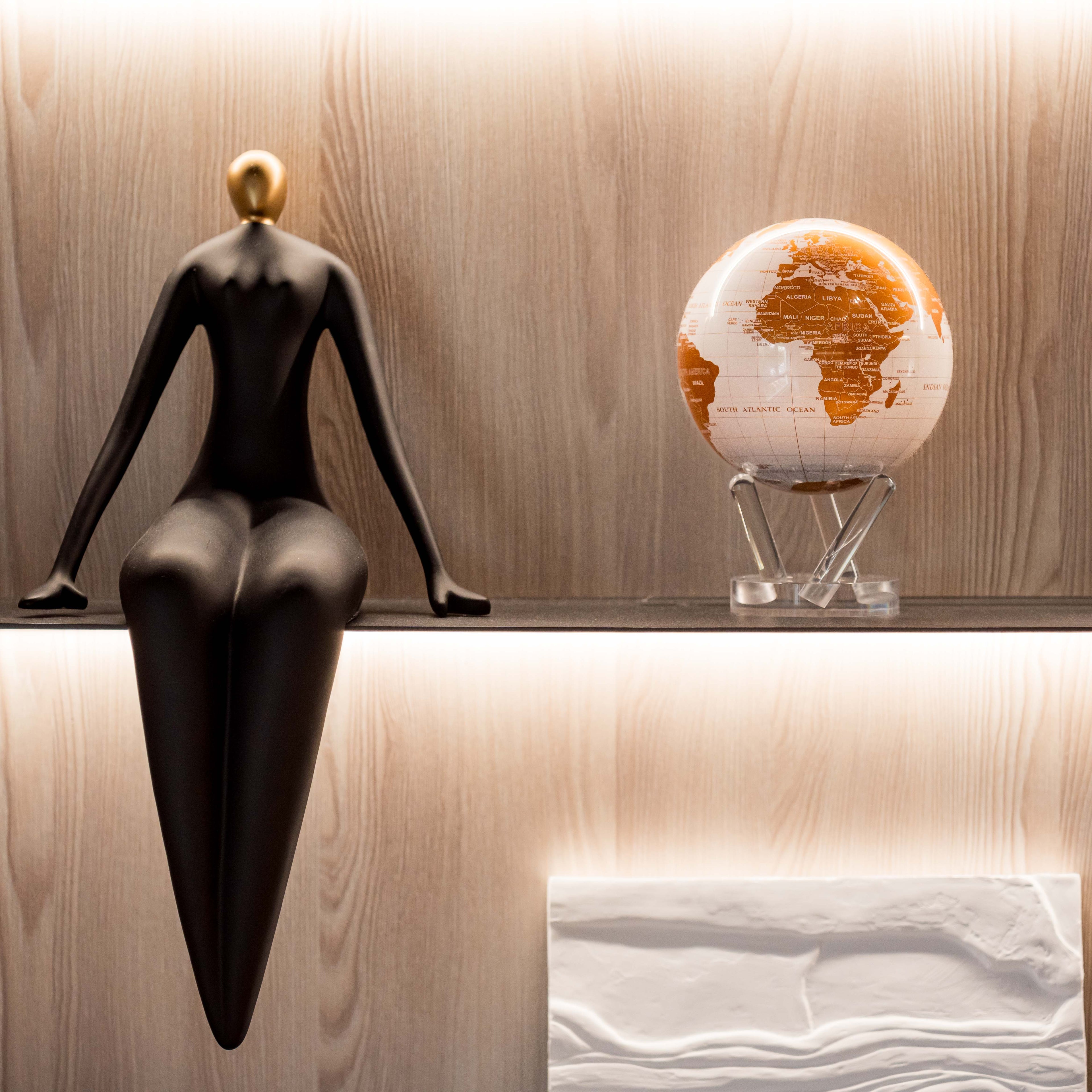 Pearl White &amp; Gold globe on display shelf