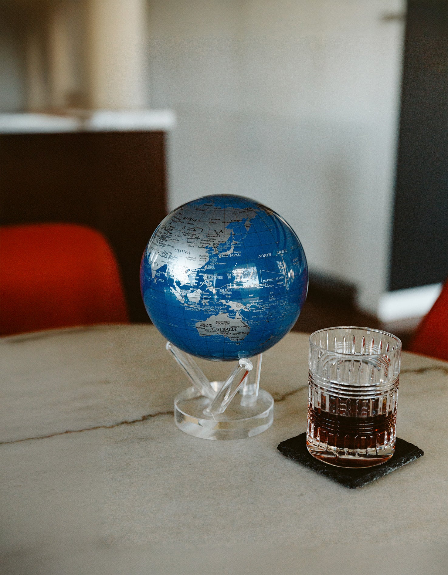 Contemporary MOVA globe featuring detailed metallic world map artwork