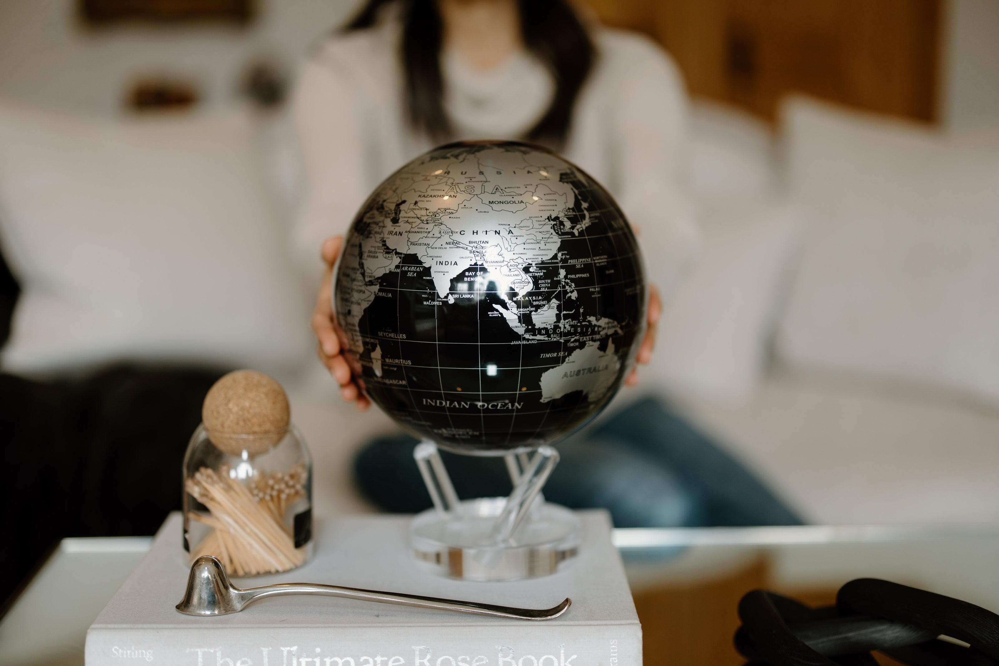 Black metallic MOVA globe displayed as modern luxury desk décor