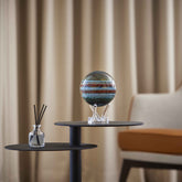 Jupiter MOVA Globe on modern side table in living room