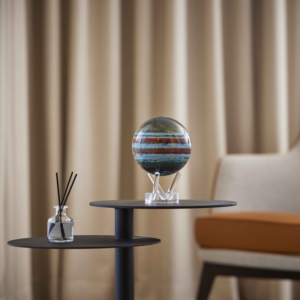 Jupiter MOVA Globe on modern side table in living room