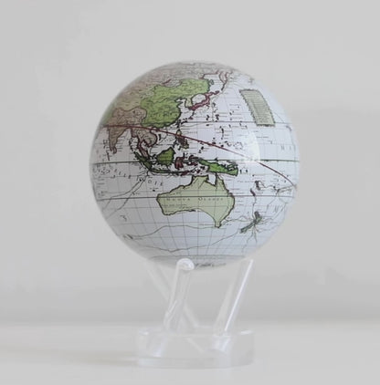 Antique Cassini whiteMOVA globe rotating on acrylic base in celestial themed showcase video