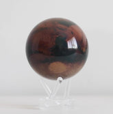 Mars MOVA globe rotating on acrylic base in space themed product display video