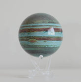 Jupiter MOVA globe rotating smoothly on acrylic base in planetary product showcase video