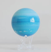 Uranus MOVA globe rotating on acrylic base in planetary themed product showcase video