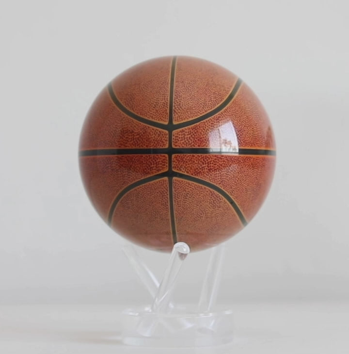 Baseketball MOVA globe rotating on acrylic base in decorative product showcase video