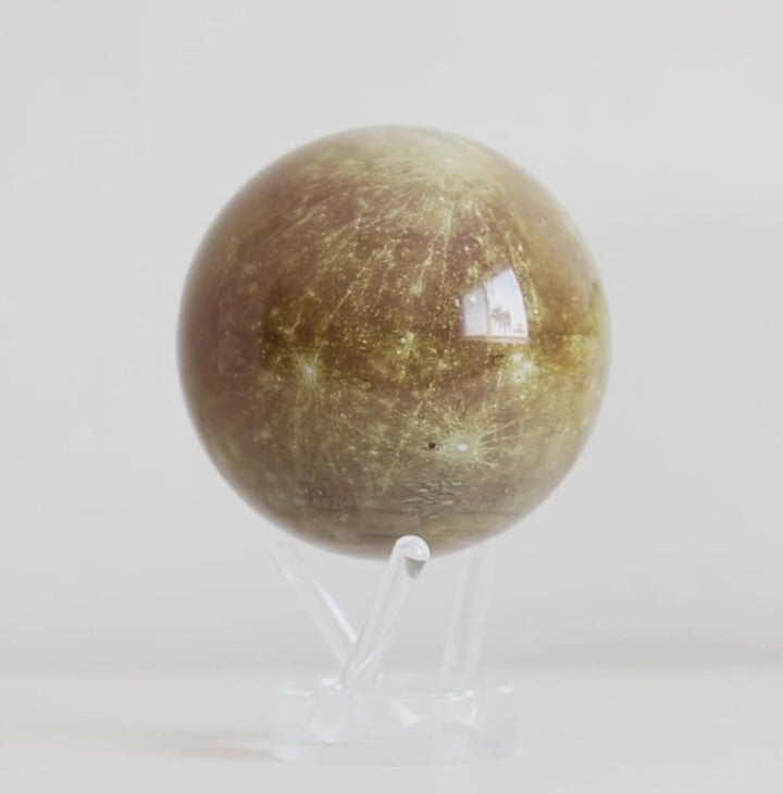 Mercury MOVA globe rotating on acrylic base in solar system themed product showcase video