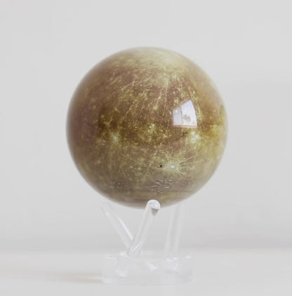 Mercury MOVA globe rotating on acrylic base in solar system themed product showcase video